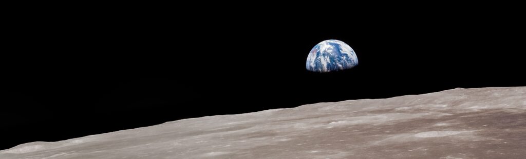 Earthrise over the surface of the moon