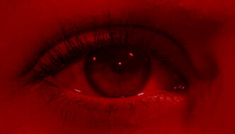 Close up of an eye, with red filter